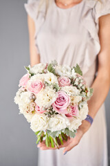 Wall Mural - Bridal bouquet. The bride's . Beautiful of white flowers and greenery, decorated with silk ribbon.