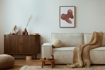craeative composition of living room interior with mock up poster frame, beige sofa, wooden commoda,