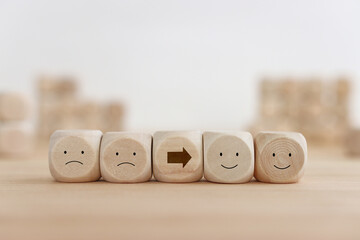 Wall Mural - Top view image of table with note of happy and sad face. concept of happiness emotion and satisfaction