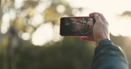 Sticker - Nature video, hand and a phone in the sunset, mountain view or sunshine in the morning. Bokeh, relax and a person with a mobile for photography in the environment in summer on an outdoor vacation