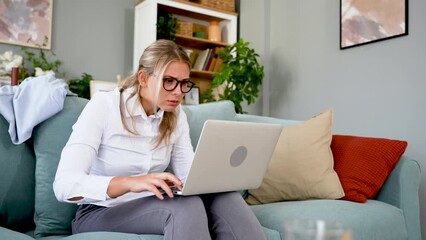 Wall Mural - Frustrated annoyed woman confused by computer problem, annoyed businesswoman feels indignant about laptop crash, bad news online or disgusting video on web, stressed student looking at broken comp