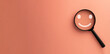 © Pakorn - Positive Thinking,Happiness,Positive Attitude,mental health assessment idea.,Magnifyglass focus on smile face icon over pink pastel background with copyspace.