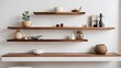 Wood floating shelf on white wall. Storage organization for the home