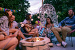 © ivanko80 - Group of friends having party by swimming pool