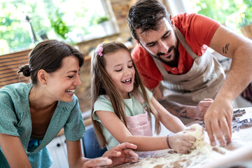 Wall Mural - Family makes a cookie in the kitchen