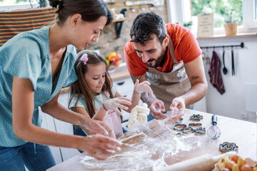 Poster - Family makes a cookie in the kitchen