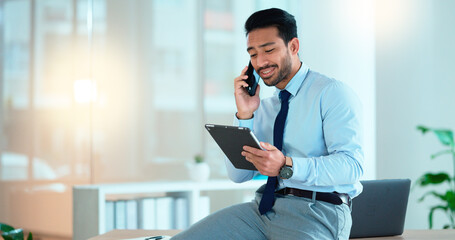 Sticker - Business man talking on a phone while browsing on a digital tablet in an office. Dedicated sales executive and young expert communicating project plans and discussing deals with clients in a company