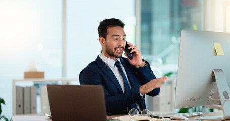 Poster - Happy business man talking on his phone while working on a computer and smiling alone at work. Young corporate professional having a discussion and explaining project details to a colleague or client