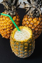 Sticker - Delicious pineapple filled with a cocktail with a straw