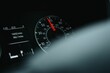 Speedometer and other gauges on the dashboard of a car