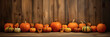 fondo de tablones antiguos de madera con calabazas naranjas y amarillas en hilera. concepto de halloween .Ilustracion de IA generativa