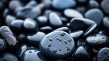 Close-up Glossy Black Wet Pebbles. Macro, Pebble Background. 