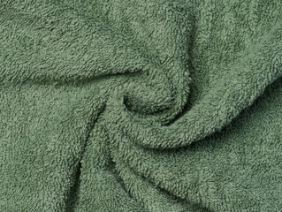 Wall Mural - Texture of a green terry cotton towel, canvas. Macro