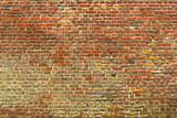 Fototapeta Do pokoju - Old red brick wall with different shades. Texture of a brick wall