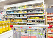 © lado2016 - choosing a dairy products at supermarket.various goods on the supermarket shelves