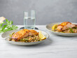 © Darren Muir/Stocksy - Roasted salmon fillet with rice