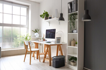 Canvas Print - Programmer's workplace with computer in interior of light office