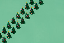 Seamless Pattern With Green Christmas Trees On The Backdrop
