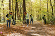 © Oleksii Syrotkin/Stocksy - Environmental volunteer together clean up responsibility ecology