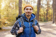© Oleksii Syrotkin/Stocksy - Active tourist daylight adventure autumn forest