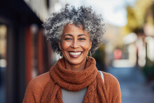 Beautiful Middle-aged African-American Or Black Woman In Her Fifties, Smiling, Radiating Warmth And Positivity, Expressing Confidence And Joy.