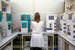 © Albert Martinez/Stocksy - Woman in white lab coat on her back in the laboratory