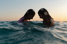Two Girls In The Gulf Of Mexico Laughing