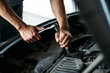 © Studio Firma/Stocksy - Mechanic Repairing Car