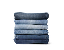 Stack Of Different Folded Jeans Isolated On White