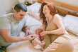 © Inna Reznik/Stocksy - Milestone in Lives of Young Couple The Birth of Their First Child.