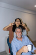 © Pedro Merino/Stocksy - Funny Direct Flash Lo-Fi Photo Of Coworkers Having Fun in the Office