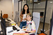 © Pedro Merino/Stocksy - UGC and direct flash photo of coworkers during a party in the office
