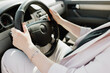 © Alexey Kuzma/Stocksy - woman driving the car