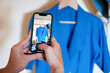 © Malquerida Studio/Stocksy - Photographing clothes with mobile phone