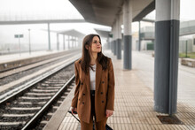 Young Woman In Train Station