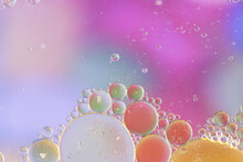 Colorful Oil Drops On The Water Surface  