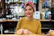 © Alvaro Lavin/Stocksy - Portrait of woman working in bar.