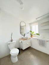 Bright White Refreshing Modern Bathroom After Renovation