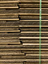 Stack Of Cardboard Boxes In Warehouse Shipping Facility Texture 