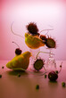 © Natalia Mishina/Stocksy - Set with exotic fruits and mini patissons with cherries.