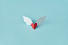 Red Heart With White Wings Made Of Colorful Paper.