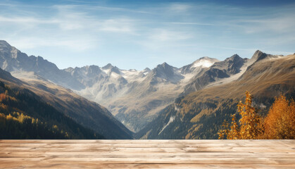 Empty wooden desk with autumn mountains background