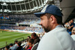 © Irina Polonina/Stocksy - Male fan at football match.