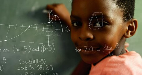 Wall Mural - Animation of mathematical equations over african american boy writing on chalkboard at school