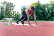 © DusanJelicic - Engaged in her workout, the black woman excels on the exercise mat. From dynamic stretches to plank poses, she maintains balance and form.