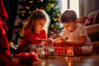© the_lightwriter - kids celebrate Christmas with gifts