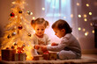 © the_lightwriter - kids celebrate Christmas with gifts