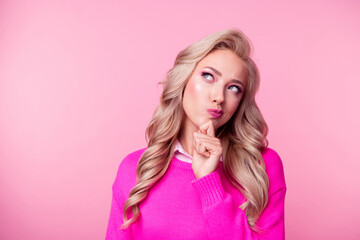 Poster - Photo of charming suspicious lady wear sweater arm chin looking empty space isolated pink color background