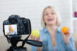 © missty - Happy woman blogger shows fruits to the camera. Selective focus.