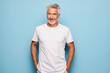 Older man wearing a white t-shirt, for canvas or mockup, blue blackground